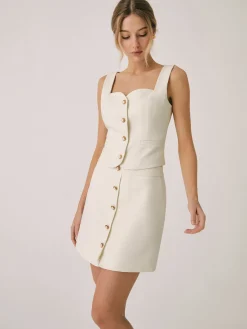 Elegant Pearl Buckle Mini Skirt