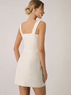 Elegant Pearl Buckle Mini Skirt