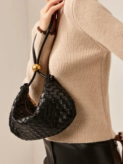 Golden Ball Woven Zipper Dumpling Bag