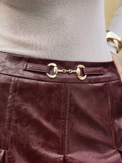 Metal-Detail Pleated Faux Leather Skirt